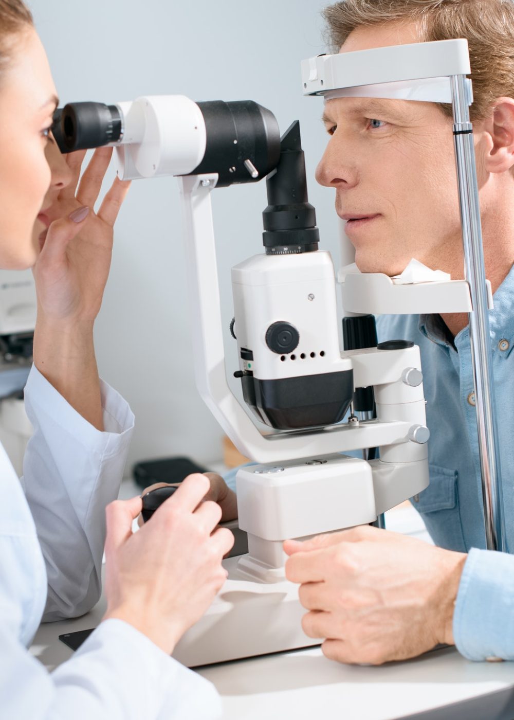 professional-oculist-examining-man-with-visual-field-test.jpg